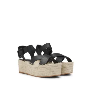 Leather sandals with platform sole