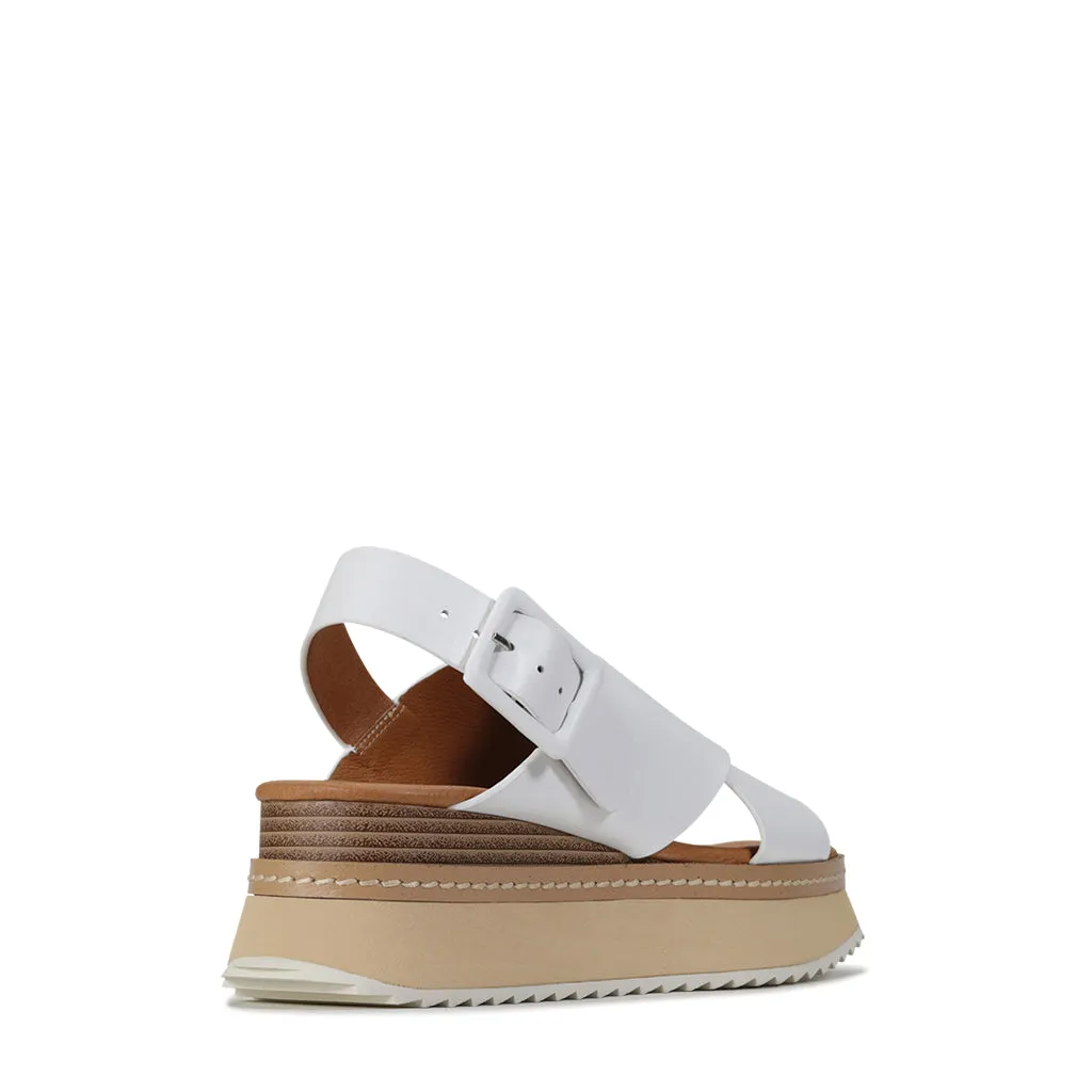 TONALITIES LEATHER PLATFORM WEDGE SANDALS